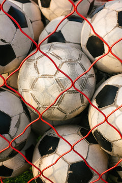 Net full of footballs