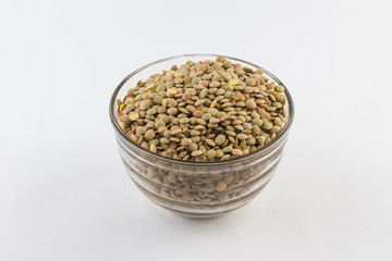 Raw Lentils in a glass bowl