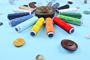 Background with sewing tools and accessories.
