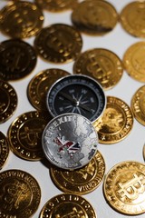 Brexit coin near compass