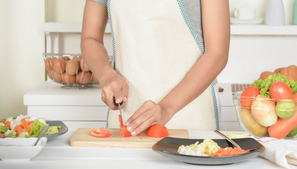 Obraz na płótnie Canvas Women and Food in the kitchen