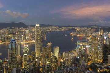Fototapeta na wymiar Victoria harbor of Hong Kong City at dusk