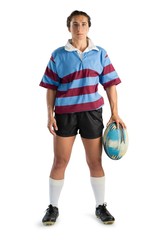 Full length portrait of young female player with rugby ball