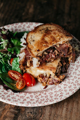 Reuben Sandwich on a rustic background