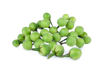 bunch of fresh pea eggplant on white background