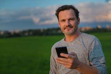 Outdoor Man with mobile portrait