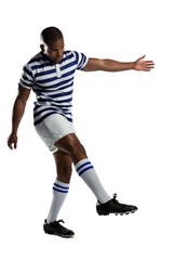 Fototapeta na wymiar Full length of male rugby player playing