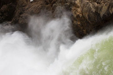 Close Up of the Brink of the Lower Falls of the Yellowstone River in Yellowstone National Park. Photographed from above.