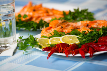 Delicious Mediterranean seafood shrimps and crawfish close up