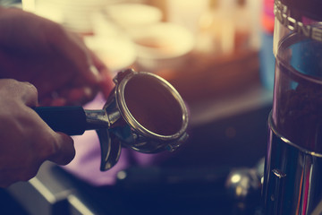 barista making coffee