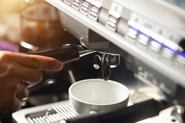 barista making coffee