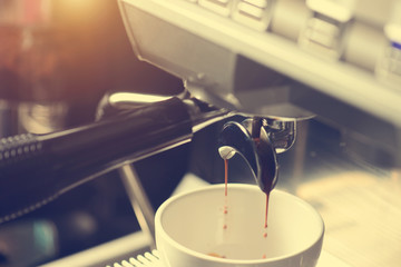 barista making coffee