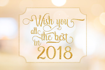 Obraz premium Wish you all the best in 2018 gold glitter word on white frame at abstract blurred bokeh light background, Holiday concept.