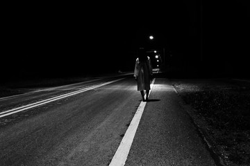 Mysterious Woman, Horror scene of scary ghost woman standing outdoor on street with light in white...