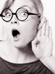 Shocked girl eavesdropping.