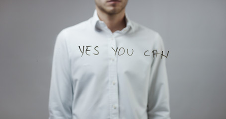 Yes you can , Man Writing on Glass