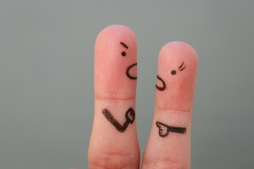 Fingers art of couple in quarrel. Man and woman swear.