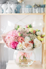 Bouquet in Foamiran paper. A simple bouquet of flowers and greens