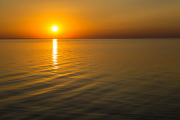 Orange sunset . Siwash lake. Ukraine