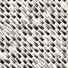 Vector seamless pattern with brush stripes and strokes. Black and white background with ink elements. Hand painted grunge texture.