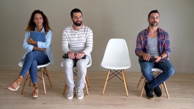 Group of young people in waiting for an interview