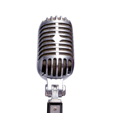 Silver microphone in front on a white background. Isolated