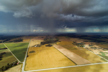 Rain clouds in latvian countryside.