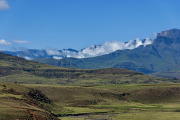 Fototapeta na wymiar Part of awesome Drakensberg mountain with clouds, South Africa