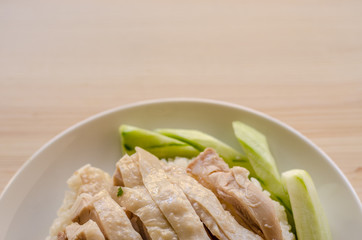 Hainanese chicken rice or rice cooked in chicken broth