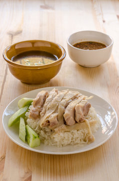 Hainanese chicken rice or rice cooked in chicken broth