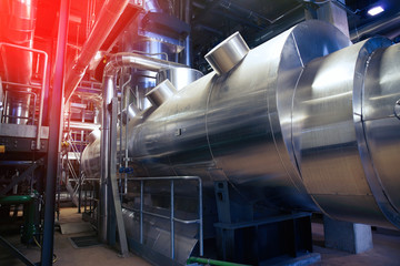 Fototapeta premium Equipment, cables and piping as found inside of a modern industrial power plant