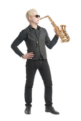 Fototapeta premium Elegant blond man dressed in black, playing the saxophone. Isolated