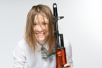 Girl with a Kalashnikov in his hand. Isolated