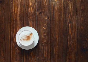 coffee cup wooden table background with copy space top view