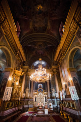 Gorgeous hall of the church decorated with golden columns