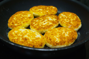 pancakes from cottage cheese, baked in a frying pan.