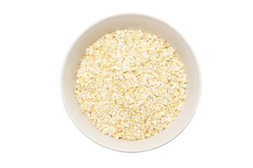 Oat in a bowl on a white background.