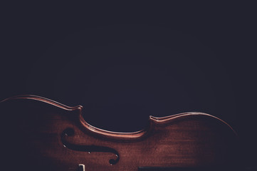 Violin musical instruments of orchestra closeup on black