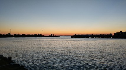 dusk of brooklyn, summer days in new york in front of the bay and the sea
