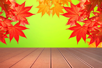 Naklejka na ściany i meble Autumn maple leaves and wooden floor