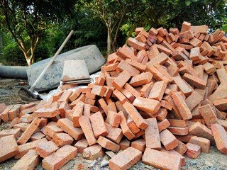 stack of red brick for bricklayer craftman construction site