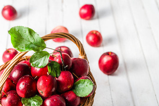 Red Apples On Table In The Basket, Pile Of Fresh Apple Fruit On White Background