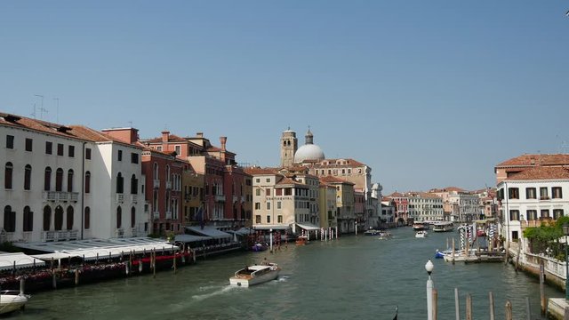 View from the Ponte degli Scalzi of boats at the canal grande in Venice Italy