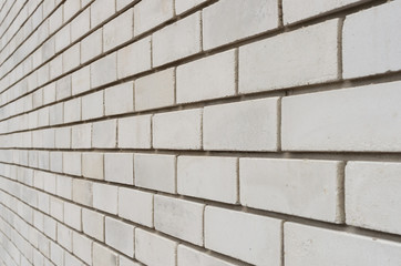 White brick wall with perspective as a background