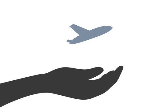 Hand hält Flugzeug