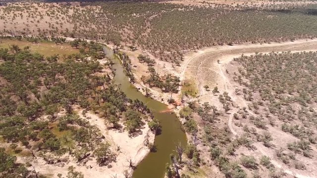Aerial Helicopter view of dried up and drought stricken Murray River Wetlands, lagoon, Billabongs and Swamps along River back water