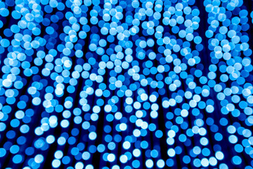 Blue abstract bokeh light at night for background.