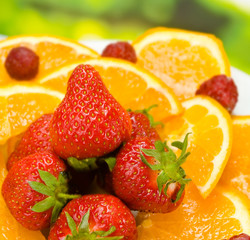 Orange, strawberry and raspberry, outdoors