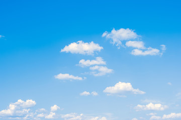 Naklejka na ściany i meble Blue sky with clouds background.