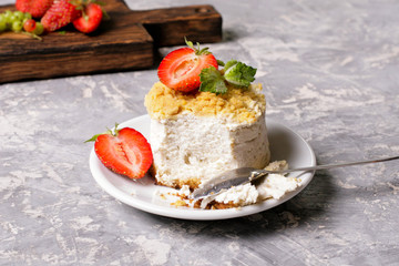Delicious cheesecake with berries on table close up